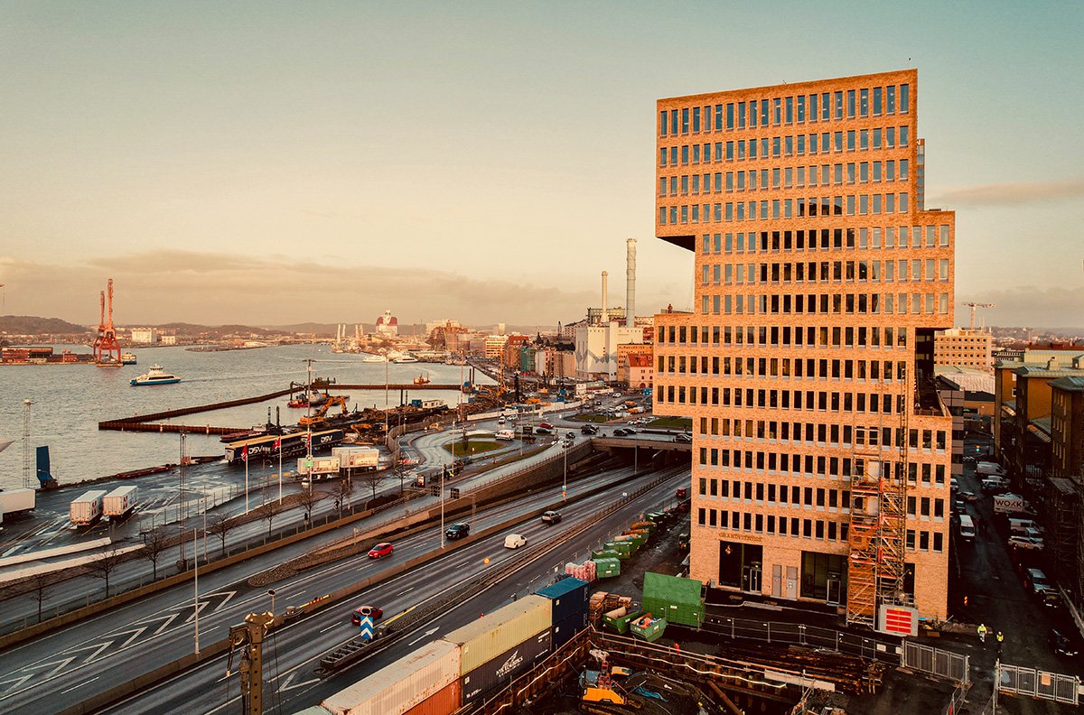 View of brick building and waterfront